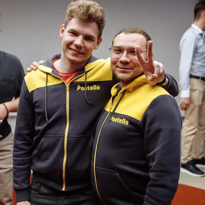 Sasha Voloshyn with his Postello co-founder in Postello hoodies at UNIT.City